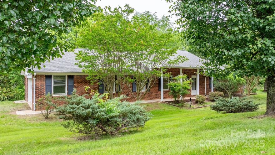 Compare square footage and price!!!  If you aren't afraid of a little "sweat equity" and updating, this property is for you!! Large Brick ranch in Hudson!! Approximately 2 acres!! This home offers both a living room and den with built-ins!! Formal dining room and breakfast area!! Beautiful hardwood flooring!! Fireplace with Gas logs. The basement area offers two finished rooms .... one with a second fireplace. Also, there's still tons of unfinished storage and a workshop area in basement with walk out door. Covered back deck! Some plumbing updates. NO CITY TAXES!! Don't miss out on this one!!