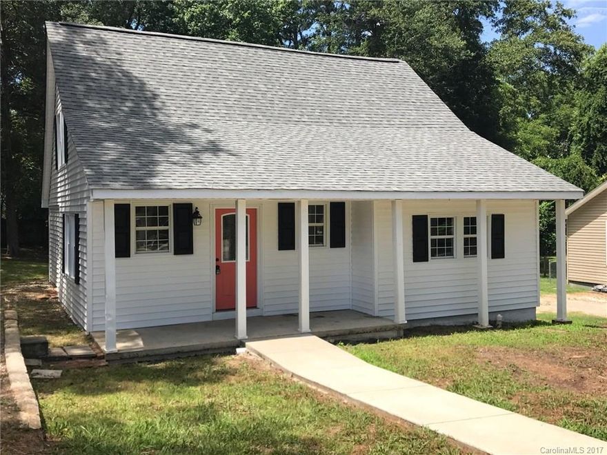 Nice 4 Bedroom cottage completely redone with new kitchen, granite, SS appliance package, new 10 year warranty Trane gas furnace/ central air, new gas on demand Rinnai water heater, new hardwoods and ceramic on entire main floor, new carpet up, new paint throughout, shaded and private back yard with nice deck