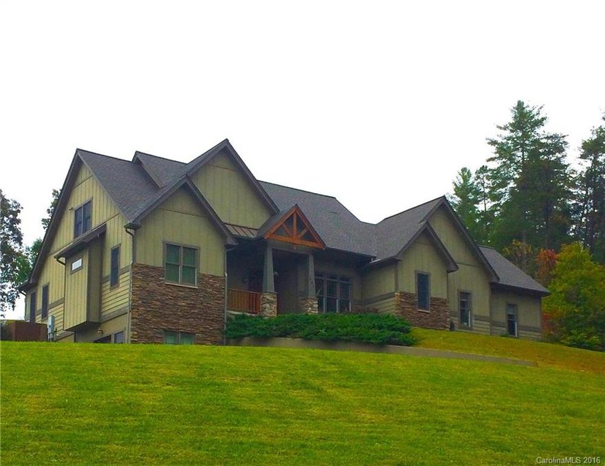 Sellers say "buy this house now!" - Gorgeous contemporary home; sophisticated living space; custom finishes & great entertaining potential in gated  Settler's Cove. Relaxing, private location on 1.13 woodland acres, minutes to the eclectic University town of Mars Hill & a short drive to Asheville. Wide open floor plan, abundant natural light, bar with hidden wine room, large walk-ins, plenty of guest space & a stunning great room with central stone fireplace - at a ridiculous steal of a deal...