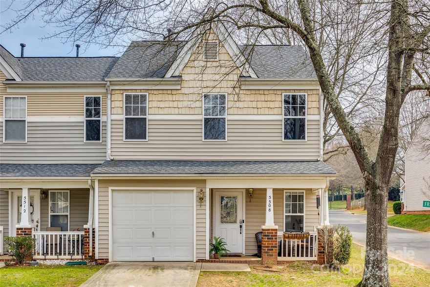 Welcome HOME in the prestigious gated community of STONEBROOK! Charming townhouse offers the perfect blend of comfort, convenience, & community amenities. As you step through the covered front porch, you'll feel the warmth & elegance of this home. Spacious layout boasts 2 primary beds w/ full baths. Ample space for relaxation & entertaining. Main level features updated vinyl floors with seamless flow from living area, kitchen w/ breakfast bar & back patio. Modern fixtures add a touch of sophistication, illuminating with style. Upstairs has plush carpeting throughout, providing a cozy retreat. Oversized 1-car garage w/ plenty of storage. End unit w/ private back patio. Residents enjoy an array of amenities: an outdoor pool, dog park, & recreational area for leisure activities. With sidewalks & street lights enhancing the neighborhood's charm, you'll love meeting your neighbors. Conveniently located just mins from I-77, shopping, dining & entertainment. Won't last long! Schedule today!