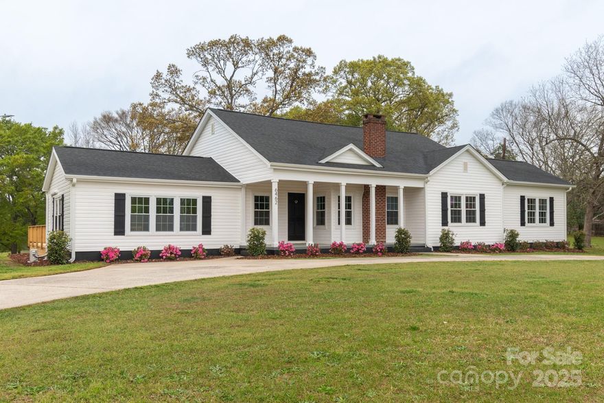 This fully remodeled ranch-style farmhouse sits on 2.36 acres, blending modern upgrades with country charm. Inside, an open layout connects living spaces, featuring new appliances and hardwood floors throughout. With four bedrooms and two baths, there’s plenty of room. Highlights include a custom pantry, drop zone, and utility room. Enjoy the covered front porch, rear deck, and peaceful farm views. A circular driveway offers easy access and ample parking. A separate 1-bed, 1-bath guest suite adds flexibility for visitors, rental income, or multi-generational living. This stylish, spacious home is move-in ready.