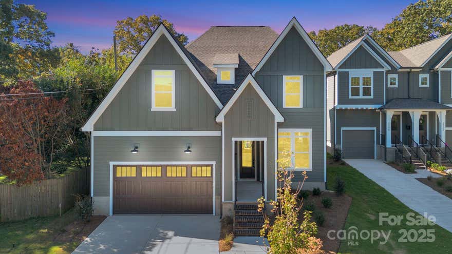 This stunning NEW VISTA HOME at 2530 Elkwood Circle is a dream come true. Over 2,843 square feet of luxurious living space, this 5-bedroom, 3-bathroom home features a spacious open floor plan perfect for both entertaining and everyday life. You will appreciate the thoughtful details, including the convenient built-in coat and shoe storage off the 2-car garage, making for quick and easy clean-up. The gourmet kitchen is a chef's delight with sleek quartz countertops, gold fixtures, and designer lighting, while the cozy gas fireplace and walls of windows create a warm and inviting atmosphere. Retreat to the primary suite, where a spa-like bathroom with a soaking tub and a tankless water heater offers a private escape. The covered porch is an ideal spot for morning coffee while the kids play in the fenced yard. This location is unbeatable, enjoy a night out in NoDa or Plaza Midwood all just minutes away, peaceful family-friendly neighborhood and quick access to  the city's best offerings!