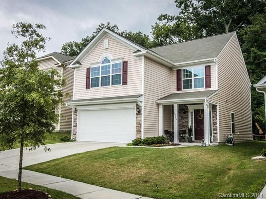 MOVE IN TODAY! Beautiful, picture perfect home with upgraded kitchen to include ss appliances, designer tile backsplash/cabinet pulls makes it one of a kind. OPEN FLOOR PLAN. From the upgraded trim, ss system to ceiling fans and h/h cabinetry in the master bath you will feel you are in a home in a higher price range Kitchen/family room opens to enlarged patio, lush lawn leads you to a 12x19 designer deck which projects out into natural treed area which provide great privacy for your enjoyment.