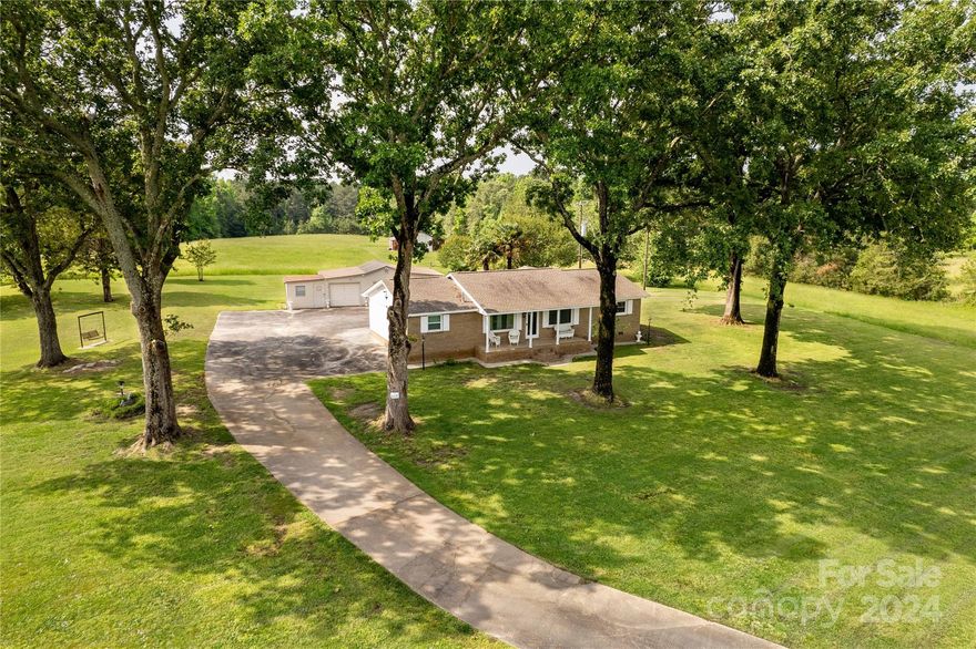 Embrace the opportunity to build your dreams with this three-bedroom, two-bathroom home on over fifteen acres of mostly cleared land.  With a single owner's dedication evident throughout, this serene retreat offers spacious interiors for relaxation and entertainment. Outside, a well-equipped, detached, three car garage/shop and a barn, both wired, present endless possibilities for hobbies or storage. Discover the perfect harmony of rural living and modern convenience, coupled with the exciting potential to expand and build your vision on this cherished haven."