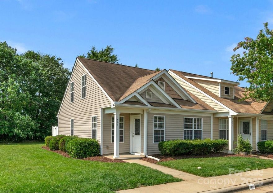 This charming end-unit townhome in desirable Brookchase offers easy living w/ 3 beds, 2 baths & 1,188 sqft. Meticulously maintained, the inviting interior showcases an open floor plan w/ vinyl plank floors & abundant natural light. The efficient kitchen features sleek black appliances, breakfast bar & ample cabinetry. Relax in the spacious living room or retreat to the private upstairs suite w/ full bath—ideal for guests or a home office. Outside, enjoy peaceful mornings on the cozy front porch or entertain guests on your fenced deck. Lawn maintenance incl. in HOA. Convenient assigned parking, guest spaces & community amenities—pool, picnic area, sidewalks & walking trails. Prime Indian Land location near shopping, dining & more. Newer build (2006), easy commute to Charlotte. Perfect for downsizing or a low-maintenance lifestyle. Move-in ready, don’t miss out on this gem!