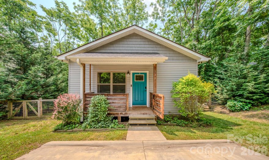 *No storm damage or water issues from Helene* Discover this inviting 3-bedroom, 2-bath bungalow tucked along a peaceful creek in West Asheville. This 2019 construction home blends classic character with creative flair — from unique wall art and custom lighting to thoughtful design details throughout. Step inside to a warm, open living space perfect for relaxing or entertaining. The kitchen offers modern updates and easy flow into the dining and living areas. Each bedroom feels cozy and bright, and both bathrooms are stylishly appointed. Outside, enjoy your own fenced-in backyard oasis — ideal for pets, gathering around the fire pit, or simply unwinding to the gentle sounds of the babbling creek. With its artistic touches and serene setting, this home captures the spirit of Asheville living at its best.

Property video link: https://drive.google.com/file/d/19dK3rUEs3E3bIxis1TSP63oisIJi7dtJ/view?usp=drive_link