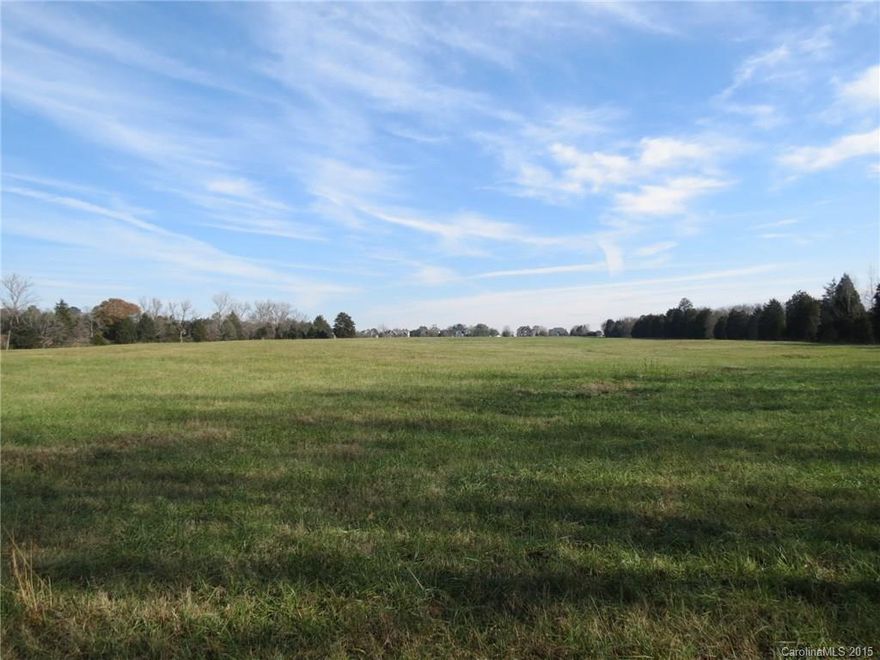 Beautiful tract of land that has it all.  Mostly pasture with some woods around the large creek.  The property has a nice build site on top of a hill that overlooks the pastures and the creek.  The property is part of a larger tract that is being split into 3 equal tracts.