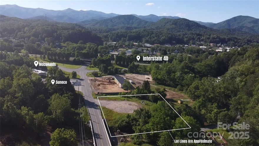 Rare opportunity to invest in the growing town of Old Fort. This lot is 0.1 miles from I-40, located off exit 73 on Bat Cave Road. The property borders a stretch of the Catawba River and is just one minute from Hillman Beer, 7 minutes from Catawba Falls, and 30 minutes to Asheville.

City water and sewer are available along Bat Cave Road. Electric hook up is also available. This lot offers excellent potential for various business ventures. Bring your buyers, your vision, and your offers today.