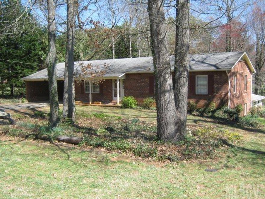 Full brick ranch with partially fenced backyard. Spacious bedrooms. Nice level yard perfect for playing soccer, football and baseball. Neat clean neighborhood. Large unfinished basement perfect for a workshop. The basement also includes a garage. A rear deck overlooks the backyard. Laundry on the main level. With a large living room and a separate spacious den, multiple places to entertain.