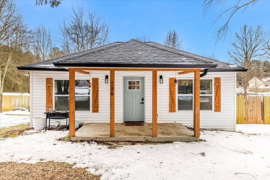 Updated Mooresville Home on a Large Lot — NO HOA!

Welcome to 126 Laura Road, an updated and inviting home that blends classic charm with modern finishes—all with the freedom of NO HOA. Set on a generous 0.34-acre lot, this property offers a spacious fenced in backyard and a large back deck, perfect for entertaining, grilling, or relaxing outdoors.  Inside, you will find 2 spacious bedrooms, a flex room that is perfect as an office, nursery, or 3rd bedroom, 1 full bath, and 1,027 sq ft of comfortable living space. 

The beautifully updated kitchen features gorgeous granite countertops, stainless steel LG appliances, and shaker cabinets.  2-panel shaker interior doors flow throughout for a clean, cohesive look.  The spa-like renovated bathroom is a true retreat, complete with stunning gold hardware and a luxurious rain shower.  Both bedrooms feature custom-built closet systems designed for maximum organization, complete with cubbies on both sides and a center hanging bar for effortless storage and style.  Thoughtfully designed to keep everything neat, tidy, and easily accessible.  

This home is also perfect for adding on, offering plenty of space and potential to expand, customize, or create your dream layout exactly how you envision it. Plus, the roof, furnace, and air conditioner were replaced in 2022, all providing peace of mind for years to come.  

Conveniently located in a quiet, established neighborhood yet just minutes from major highways, you’ll enjoy quick access to Mooresville, Lake Norman, and the greater Charlotte area.  With modern updates, a spa-like bathroom, spacious backyard, expansion potential, a newer roof, furnace, and air conditioner; excellent highway access, and NO HOA, this home delivers comfort, flexibility, and endless possibilities. Schedule your showing today!