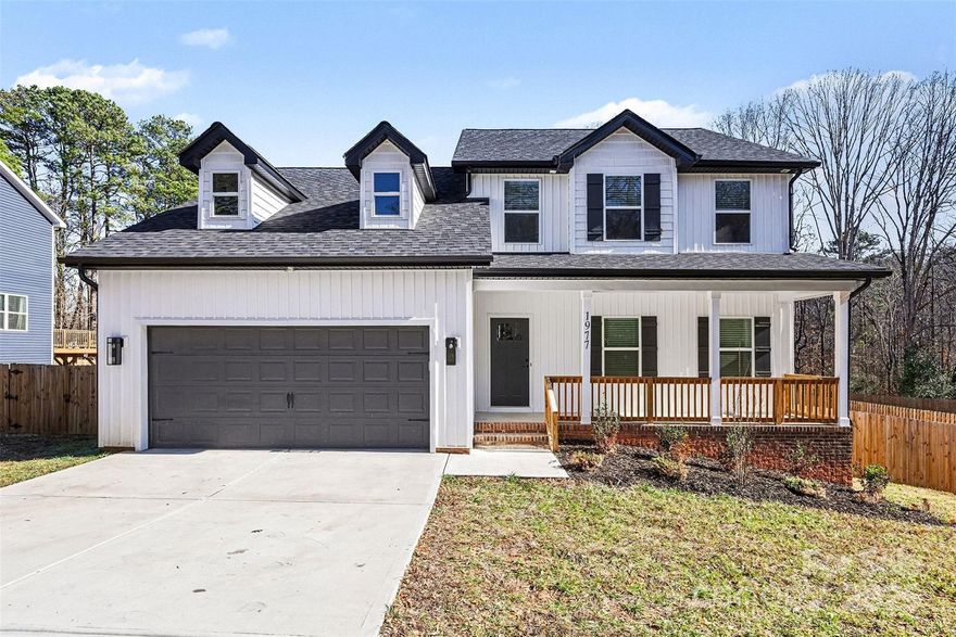 Built in 2024, this 4-bedroom home with a bonus room includes a main-level bedroom with full bath and sits on over an acre with a fenced yard—all with no HOA. The seller has gone above and beyond, adding a whole-home water filtration system, an insulated garage perfect for a home gym (epoxied floor included), water heater protection with a 25-year warranty, and a free-standing dry storage under the deck. Truly better than new!