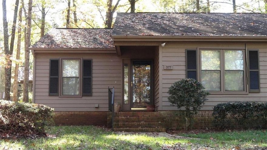 This condo is amazing!  End unit, 2 large bedrooms, 2 full baths, large patio in back, breakfast bar, dining room, fireplace in den, FORT MILL SCHOOLS!  Very convenient to restaurants, shopping, I-77, airport.  Beautiful mature hardwoods and flowering shrubs abound!  Unit includes an outside storage unit and a brand new washer/dryer.  HOA responsible for all exterior maintenance and landscaping.  USDA eligible!