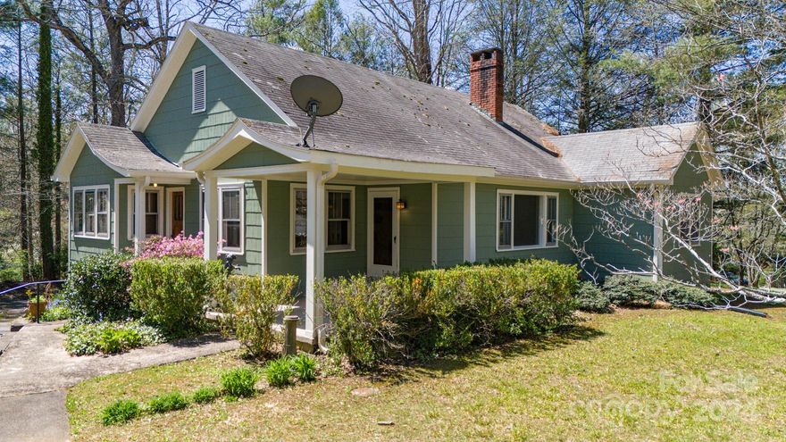 Easy walking distance to downtown Black Mountain and Lake Tomahawk under $550K! An incredible opportunity knocks with this partly refreshed property that is a blank canvas for savvy buyers to finish to their tastes! New paint inside and out, new flooring in kitchen and main bath, new water heater, and more has already been done. Beautiful hardwood floors, too. Full bath in basement and outside entrance could make this property a possible double rental! Don't walk -- run -- to take advantage of this incredible opportunity. Schedule your showing now!