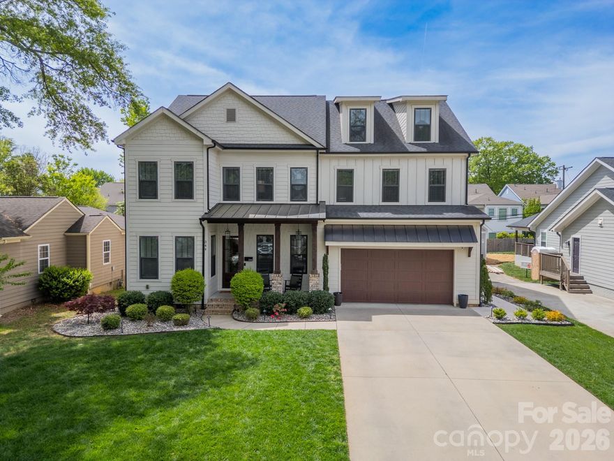 Your home search ends here. Welcome to this stunning custom home in the heart of Sedgefield, just steps from South End’s vibrant restaurants, shops, breweries, and the light rail—offering the best of Charlotte right at your doorstep. This beautifully designed 5-bedroom home features hardwood floors throughout the entire first and second levels. The gourmet quartz kitchen opens seamlessly to the family room with custom built-in shelving and a cozy gas fireplace, creating the perfect space for both everyday living and entertaining. A spacious screened porch extends your living area outdoors—ideal for hosting or relaxing when you go outside to see your resort style yard. New in 2025, the backyard has been completely transformed into a private oasis featuring a resort-style saltwater pool with waterfall and hot tub, travertine pool deck, gas fire pit, and professional landscaping with custom lighting. A separate suite includes a living area, Murphy bed, kitchen, bathroom, and laundry—perfect for guests or extended stays. Additional storage for pool equipment is also included. Enjoy a fully integrated Sonos sound system throughout the first floor, third floor, pool house, and outdoor areas—perfect for entertaining. Retreat to your oversized primary suite offers a true sanctuary, complete with a spa-like bathroom featuring dual vanities, two separate walk-in closets, and a luxury smart toilet with heated seat, bidet, and automatic features. A standout feature is the third-floor bonus space, perfect for a media room, game room, or entertaining area, along with a private 5th bedroom and full bath—ideal for guests.