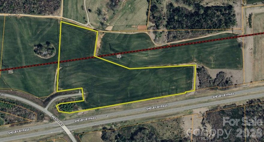Price Reduced!  New Shelby Bypass is OPEN from Hwy 74 to Hwy 150.  This property offers exceptional visibility and above-average acreage, making it a prime opportunity for commercial buyers. Located just north of the new Shelby bypass, it provides easy access and visibility to traffic between Charlotte and Asheville. The parcel boasts approximately 1,500 feet of visibility along the bypass and around 600 feet of accessible frontage on Westlee Street, which connects to Highway 74 via a traffic light.  Exceptional investment opportunity in Shelby, NC.