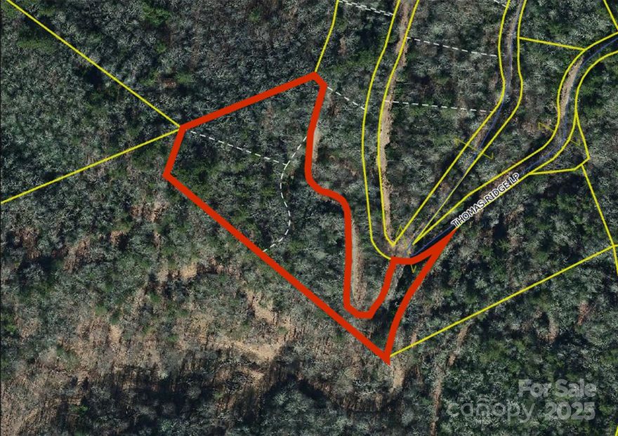 This 2.91 Acres is portion of Laurel Highlands. Seller willing to sell this separate from larger tract if desired, which would be good homesite. There are restrictions for Residential Use only and no trailers/mobile homes allowed (some minor restrictions) and joint road maintenance. Property has small waterfall stream thru property and easy access off Thomas Ridge Loop roadway on private gravel drive.  Power would need to be underground from electric pole on Thomas Ridge Loop Road. This is small wooded tract of 3 separate lots but would be ideal for one home, maintaining the privacy you will appreciate! Property being sold as acreage tract (includes 3 lots - C5, C7, C8). Legal description is C5 - portion of DB 754/671; C7 - portion of 754/668; C8 - portion of DB 316/679 of Yancey Registry.