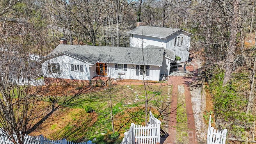 Enjoy the perfect blend of tranquility and convenience in the sought-after Sardis Hills neighborhood. 

Situated on a generous wooded lot, this beautiful home offers flexibility for a variety of lifestyles and features a spacious, fully fenced yard with plenty of outdoor space to enjoy. Inside, you’ll find fresh interior and exterior paint, timeless wood floors, and charming built-ins that add character throughout. The kitchen, updated with appliances (2023), sits adjacent to the living and dining areas, creating an easy flow ideal for both everyday living and entertaining. 

The home’s unique layout includes three bedrooms on the main level along with generously sized bathrooms. Toward the rear of the home, you’ll find a full bath and closet space and a breathtaking double-height living area filled with natural light, providing a wonderful setting for gatherings. Upstairs offers excellent privacy and features a half bath along with a versatile flex space that can serve as a quiet home office, guest suite, or multi-generational living area.

 Located just minutes from McAlpine Creek Greenway and less than 10 miles from Uptown Charlotte, this home offers the perfect opportunity to enjoy space and nature while remaining close to the city.