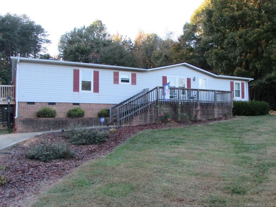 Country living at its best! Updated 3BR/2BA double wide featuring hardwoods, ceramic tile, ss appliances, woodstove, split bedroom plan, newer HVAC and roof. Backyard area perfect for entertaining with large deck, above ground pool, fit pit and large detached storage ALL sitting on 2+ acres in Clover School District.
