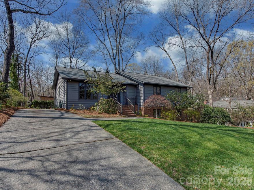 Welcome to 7244 Terrace Drive, a beautifully updated ranch nestled on nearly half an acre in the heart of Stonehaven. This 1970s home perfectly blends clean, modern design with rich, character-filled vintage charm. Step inside to a bright and inviting layout featuring warm hardwood floors, a fully finished basement, and thoughtfully designed living spaces throughout.

Enjoy a stunning, light-filled living room with a wood-burning fireplace and seamless access to an enclosed, temperature-controlled four-season porch—also conveniently located off the primary suite—creating the perfect space to relax year-round. The dining room makes a statement with its showstopping, textured ceiling, while the warm, rustic kitchen offers rich wood cabinetry, dark tiled countertops, a built-in oven and microwave wall, and easy access to the deck for effortless indoor-outdoor living.

The spacious primary suite on the main level features a walk-in closet, en-suite bath, and direct access to the four-season porch. Additional bedrooms provide flexibility and comfort, while the lower level offers inviting living space, built-ins, and multiple options for work, play, or relaxation.

With a covered patio, back deck, and four-season porch, this home offers countless ways to enjoy the outdoors. Tucked away on one of Stonehaven’s most peaceful streets, and just blocks from Sardis Swim & Racquet Club, this home delivers charm, space, and lifestyle all in one.