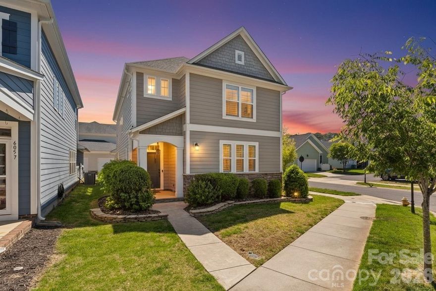 Perfectly positioned on a corner lot at the end of a quiet street, directly across from the neighborhood dog park, this beautifully maintained home offers both comfort and convenience in an unbeatable location. With easy access to I-85, commuting to Charlotte is effortless, while the charm, dining, and local shops of downtown Belmont are just minutes away.

The main level features a bright, open-concept layout designed for everyday living and entertaining, with seamless flow between the kitchen, dining, and living spaces. You’ll love the updated kitchen, complete with stainless steel appliances, granite countertops, tile backsplash, farmhouse sink, and a spacious pantry. Step outside to the side patio and fenced yard—perfect for relaxing or hosting.

Recent updates include fresh paint, and beautifully updated bathrooms, giving the home a clean, modern feel. The spacious primary suite offers a comfortable retreat with hardwood floors, a sitting or workspace area, and a well-appointed en-suite bath featuring dual vanities, a large tiled walk-in shower, and a generous closet.

Additional upgrades include plantation shutters, crown molding, custom lighting, a drop zone at the garage entry, built-in beverage fridge, and a thoughtfully designed laundry room with cabinetry and a built-in ironing board. Outdoor features a hardscape patio with lighting, and a fenced yard.

The community itself is a standout, offering a welcoming atmosphere with amenities such as a pool, clubhouse, playground, green spaces, and a dog park—making it easy to enjoy both neighborhood living and an active lifestyle.