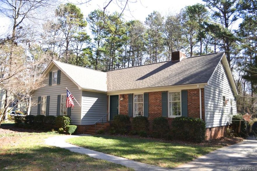 Charming Ranch with Bonus Room in Popular Matthews Equestrian Community.  Impeccably Maintained Home with Classic Styling and Custom Details including Wood-Planked Walls, Built-In Shelves, and Wood-Burning Stove.   Large Fenced Yard, and Oversized Garage with Workshop & Storage Shed.  New Roof in 2010, New HVAC in 2012.