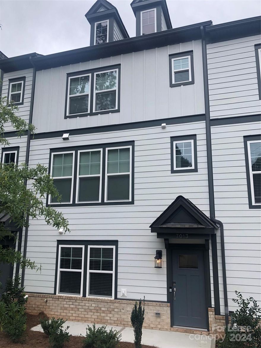 Absolutely gorgeous new construction townhome in Charlotte!!  Fabulous location and open floor plan with large island in kitchen and all the modern amenities.  Nice balcony for sitting and enjoying your morning coffee or evening beverage of choice!  Two car garage and plenty of living space.  Stainless appliances!! Luxury vinyl plank in living areas with wonderful new carpet in the bedrooms.  You won't want to miss this beautiful new home!!  Please contact agent for a walkthrough video.