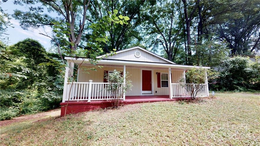 Don't miss out on this adorable 2 bedroom, 1 bath home on an acre of privacy!  Live away from it all, yet close to everything!  Rocking chair front porch, oversized kitchen, cozy living room, and close proximity to Charlotte's airport, Uptown and interstates.  Pet friendly home!  Don't miss out!