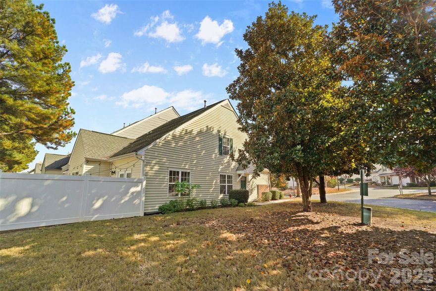 If you are searching for a low maintenance home that blends style, comfort, and thoughtful updates, this one is a must-see! Recent upgrades include a new HVAC unit 2024 and LVP flooring. Plus, the community features lawncare, playground area, sidewalks and a sparkling pool, making it a haven for fun and leisure. INDIAN LAND SCHOOLS! NO RENTAL CAP! Step into this meticulously maintained, move-in ready 2-bedroom, 2.5-bath end unit townhome with PRIMARY BEDROOM ON MAIN FLOOR and when you enter, you'll be captivated by the open, airy floor plan that seamlessly connects the inviting great room and kitchen to a charming 2nd-floor loft that overlooks it. The stainless steel appliances in the kitchen elevate the space with the refrigerator, washer/dryer stays with the home. Upstairs you will find 2nd bedroom, hallway full bath and the large loft-offering the perfect space for a home office, reading nook, or additional living area. Loft could be enclosed for 3rd bedroom. The rear fenced, private patio is a serene spot to enjoy morning coffee, small gardening or unwind in the evenings. Convenient 1 car attached garage with additional storage. Close to new Costco, Target and restaurants. Make your appointment to see this home today!