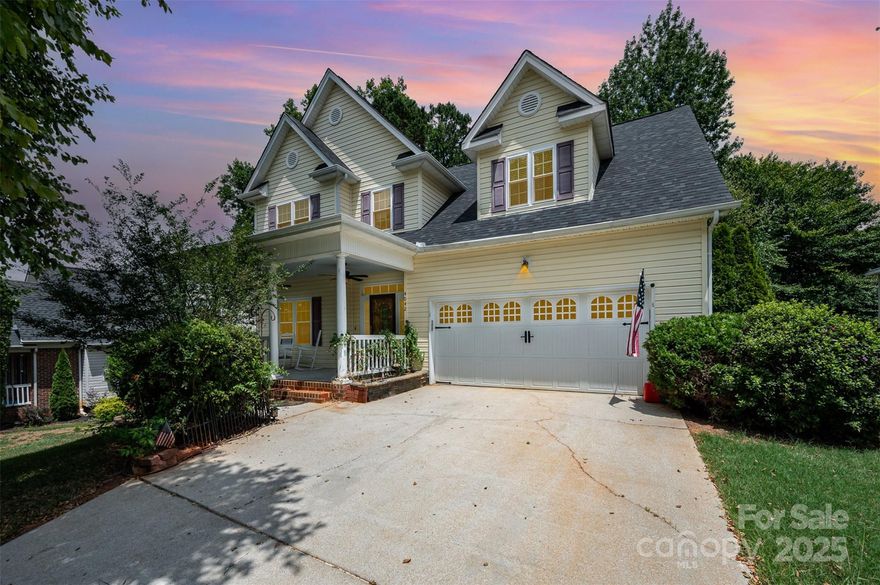 Tucked at the edge of the woods with neighborhood mountain views, this spacious two-story home features a bright, open floor plan with a dramatic two-story living room, rich hardwood floors in the entry and formal dining room, and newer carpet throughout. The large kitchen includes a breakfast area, perfect for casual meals or entertaining. The great room includes a cozy gas fireplace flanked by built-in bookcases, creating a warm focal point. Upstairs, the generous primary suite includes a separate sitting area & a bath w/ dual vanities, a soaking tub, & separate shower. Enjoy peaceful mornings on the rocking chair front porch or unwind on the screened-in back porch overlooking the natural backdrop. Recent updates include newer wood front & back sliding!  Enjoy the outdoors being less than a mile to George Poston Park that offers a pump track, designed for cyclists & skateboarders, 13 miles of biking trails, 7 miles of hiking trails, stocked lake with fishing pier & more!