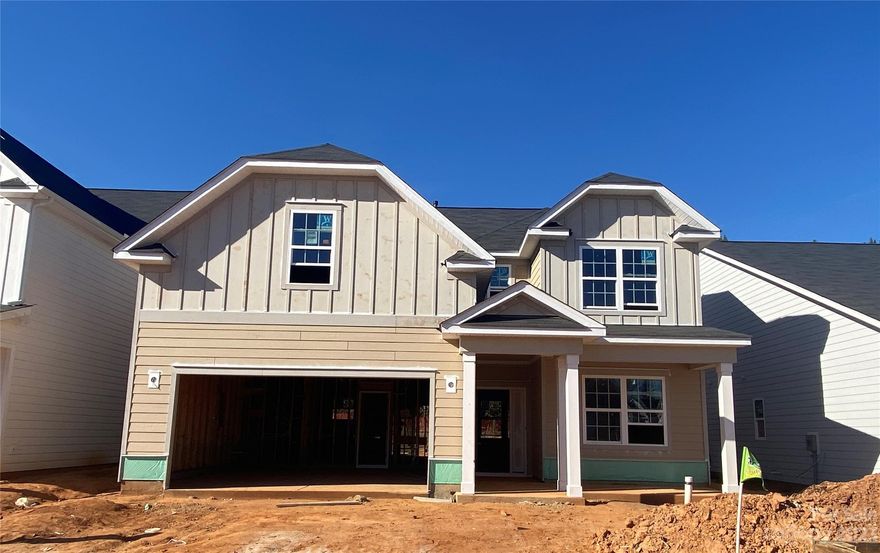 This home is located on a flat homesite with a rear covered porch overlooking the lush tree-save perimeter; it has painted composite siding with stone & board & batten accents. Off the foyer is a Flex room w/ French doors. Kitchen features white perimeter cabs w/ light stained cabs at island, GE SS Cafe app w/ gas range, chimney extraction hood vented outside, double trash pullout & rollout trays, quartz counters, tile backsplash, large SS single bowl sink w/ soap dispenser. Family room has gas fireplace w/ brick surround & timber mantle & mudroom includes built-in drop zone. Upstairs is a Bonus room; the Premier Suite has a tray ceiling; bath w/ white painted cabs, quartz counters, large tiled shower w/ semi-frameless glass enclosure, built-in shampoo niche, tiled floor. Secondary bath w/ Quartz counters, white cab, tiled floor. LVP throughout the main floor & second floor hallway. Tile in laundry. Oak stained treads on stairs. All beds have a WIC. Close to Reedy Creek Park!