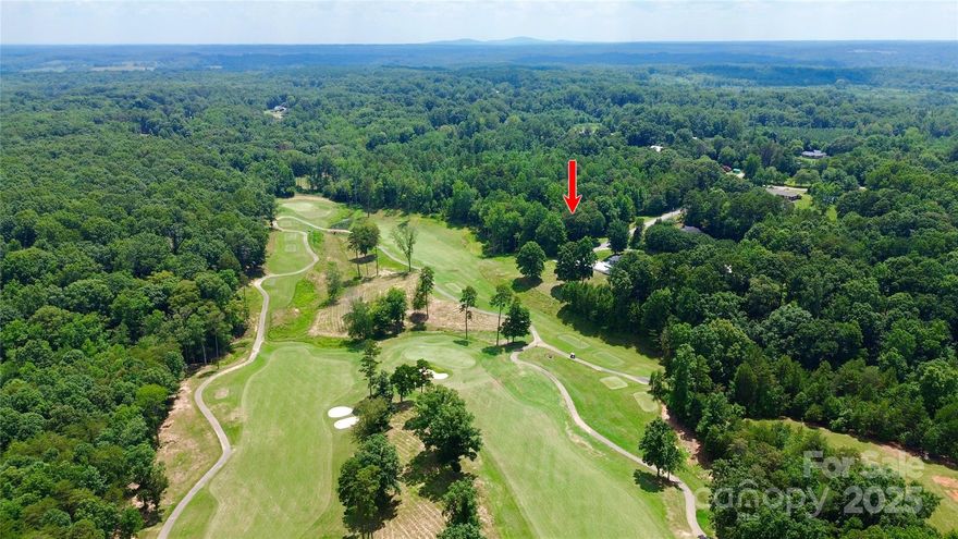 This double lot in a cul-de-sac offers beautiful golf course views of the 3rd hole of the River Oaks Golf Course.  This parcel with over an acre of wooded land, water access from the street and elevated scenic views, is a prime opportunity to build your dream home.  This property has the rare combination of both privacy and access to major thoroughfares.  It is situated between I-40 and US 70, and is a short drive to much that the area has to offer.  It has an approved perc test for a 4 bedroom septic system.  No HOA to pay or contend with.  Manufactured homes are allowed on the property.