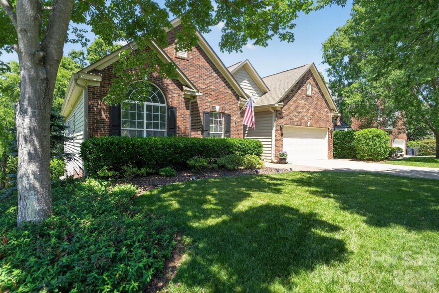 Beautiful, lovingly cared for four bedroom ranch home on the golf course in the highly sought after Northstone Country Club neighborhood in Huntersville. Open floor plan with hardwood floors, multi-level ceilings, crown moldings and amazing archways throughout the living areas. Remodeled kitchen with new leathered granite countertops, large one tub sink, touch faucet, double oven and new dishwasher and LVT.  Two french doors lead to a custom deck complete with a Sunsetter Awning all nestled in the trees that border and protect the home from errant golf balls! Master bath completely remodeled with dual vanities, free-standing whirlpool/jetted tub and zero-entry rainfall shower. Huge crawl space and two-car garage with stunning epoxy floor all with extremely low HOA fees.