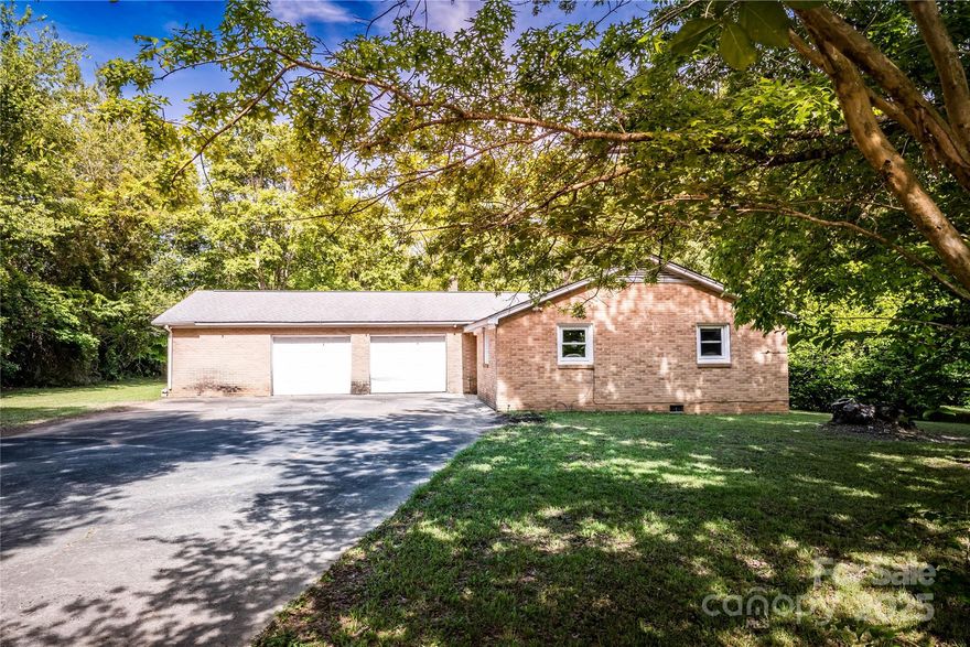 Discover the potential at 1491 Cedar Grove Road! Nestled on a beautiful one-acre corner lot surrounded by mature trees and natural privacy, this three-bedroom, one-bath home offers 1,506 heated square feet of opportunity. The oversized two-car attached garage provides ample space for parking, storage, or hobbies. This property is full of potential and ready for your personal touch. If you have the vision to bring a property back to life, whether you're an investor, a DIY enthusiast, or looking to create your dream home, this property offers endless possibilities. Conveniently located in Clover, SC - don't miss this chance to transform a property with incredible promise!