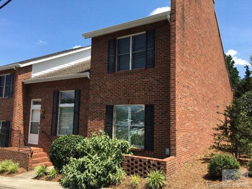 Enjoy the convenience of downtown living combined with a maintenance free, no yard work lifestyle. This end unit townhouse features 3 bedrooms, 2.5 baths, vaulted ceilings, hardwood and tile floors, brand new carpet upstairs, home office, main level master suite, loft with built-in bookshelves.  Attached garage and screened porch.