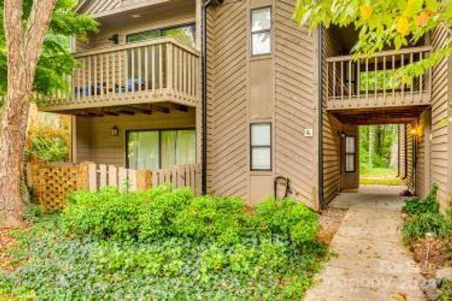 ***BOM due to buyer's home sale falling thru *** Welcome to Lake Wylie Woods! Beautifully renovated 2 bedroom condo just waiting for new owners! New interior doors, black fixtures, engineered wood floors in living areas. The kitchen offers new white "soft close" cabinets, Quartz countertops, SS appliances, stainless farm sink, and convenient breakfast bar. Woodburning fireplace in the family room. Both bedrooms are ensuite and have their own outdoor spaces, excellent for a roomate situation. Primary suite has a walkin closet with closet organizers, ceiling fan, sliding doors that lead to walled in patio. Primary bath has newer vanity with granite countertops, marble floors, and walkin shower w granite surround. Bedroom #2 has sliding doors to private covered patio. Bath #2 with marble floors, new vanity w marble tops and marble floors, tile surround in shower/tub combo. HVAC approx 5 yrs old. Convenient 1st level location, so no steps!  Community pool. This one's a knock out!