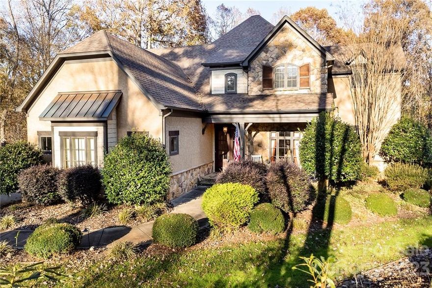 Custom waterfront home. Originally the private home of the builder who included Icyenene foam insulation, Rinnai tankless water heater, 8 foot solid core doors, custom moldings and woodwork, wormy chestnut oak floors, built-in humidifier and conditioned attic. Main Floor Primary Bed & Bath with large shower and garden tub. Two story Great Room. Gourmet kitchen with six-burner gas range and double drawer dishwasher. Two fireplaces located in Great Room and lake level Recreation room. 3 additional bedrroms and two full baths on the upper floor, along with large Bonus room. Lake level Recreation room, bar/kitchen area w/convection microwave, dishwasher, refrigerator, office/flex space, and full bath. Large deck, spacious patio and firepit. Private dock with covered slip and jet ski ramp, and access to main channel of Lake Norman. Lake irrigation. Roof replaced in 2015.