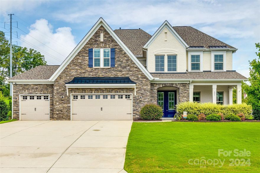 Discover the elegance of living in the Retreat at Rayfield. With over 4600 sqft, this 5 bedroom, 4.5 bathroom residence combines  comfort with  sophistication. Step through the 2-story grand foyer into the spacious, living & dining areas adorned with high ceilings, & hardwood flooring throughout. The kitchen is a chef’s delight, featuring stainless steel appliances, granite countertops,& an abundance of counter & storage space. Entertain effortlessly in the expansive family room with direct access to the outdoor oasis. No expense was spared on the professionally landscaped backyard, lush greenery, a custom-designed pool with Travertine patio, stone retaining wall, lighting & the list goes on! Additional highlights include a bonus room, a three-car garage, tankless water heater, whole home water filtration, & so much more—all designed to meet your needs with style and functionality. This home offers easy access to highway 521, ensuring convenience to shopping, dining and entertainment.