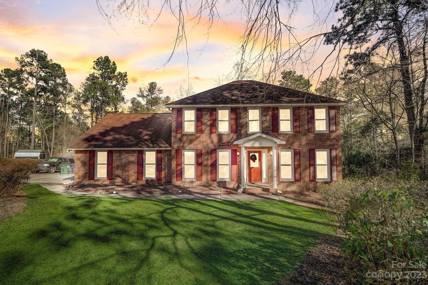 Welcome home to 324 Savannah Drive! Situated in a quiet established neighborhood on a sprawling lot, this beautiful, full brick property features 4 spacious bedrooms plus a huge bonus room up, a bedroom on the main floor, 3 full baths, a bright and welcoming kitchen with breakfast area, a lovely sitting room with tons of natural light, a cozy and inviting living room, back deck perfect for morning coffee or entertaining guests, generous storage space, new windows, new garage doors with remote, and much more! Workshop with electrical connection conveniently set in backyard which also backs into community tennis court. Enjoy a relaxing day at the lake as access is within walking distance via walkway leading to recreation and picnic areas. This property includes a one year home warranty! With numerous features and amenities, this property offers the opportunity of a lifetime to own an amazing home.