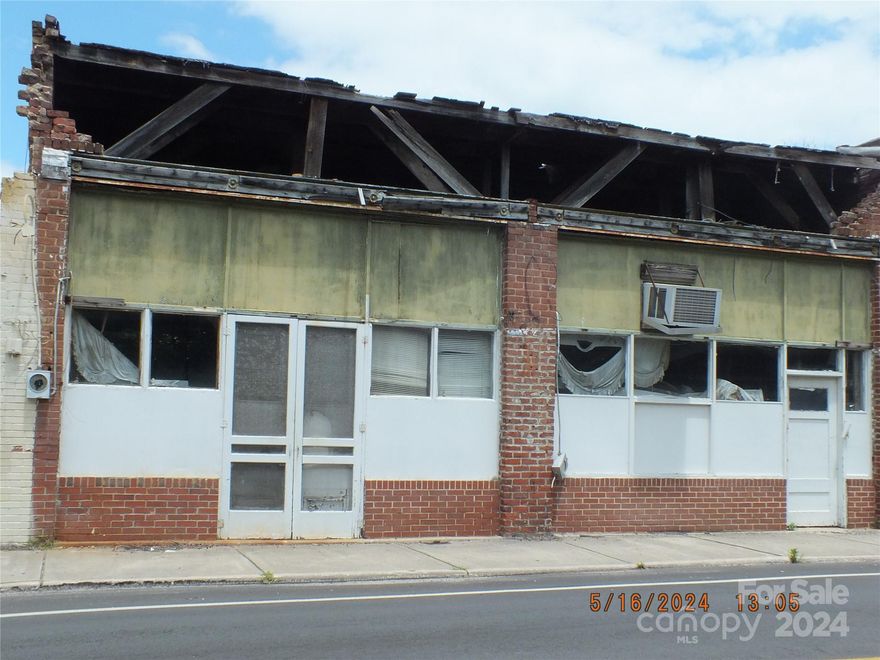 Seller bought at tax sale, has no knowledge of the building, does not know the condition of the building, has never been inside, there are no keys to get in, sale is for land and building in current condition, as is, not warranties of any kind.