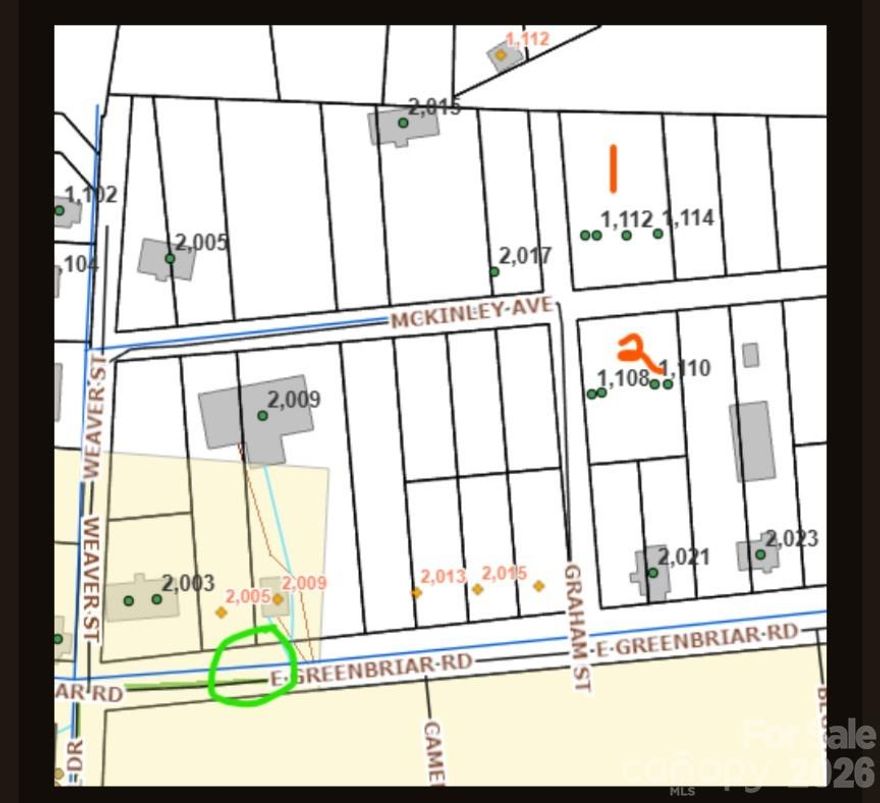 Vacant lot.  The property must be annexed before any connections can be established.  A waiver for the septic system is required for Iredell County Environmental Health to issue a permit for the septic systems.