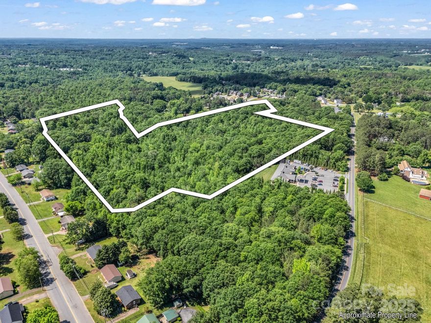 Discover the potential of this beautiful 24-acre wooded property, ready for your vision! With nearly 200 feet of road frontage on Metcalf Road, this expansive parcel offers privacy, tranquility, and endless possibilities. Whether you're dreaming of building your secluded dream home, starting a private retreat, or exploring recreational or investment opportunities, this land has the space and setting to make it happen.

Nestled just minutes from the heart of Shelby, you'll enjoy the perfect balance of peaceful country living with convenient access to shopping, dining, schools, and entertainment. The natural landscape provides a haven for wildlife, and the mature trees offer both shade and seclusion.

Utilities are nearby, making development even easier. No HOA or restrictions allow you the freedom to create your ideal lifestyle.

Don't miss your chance to own this unique piece of property with so much to offer—opportunity awaits!