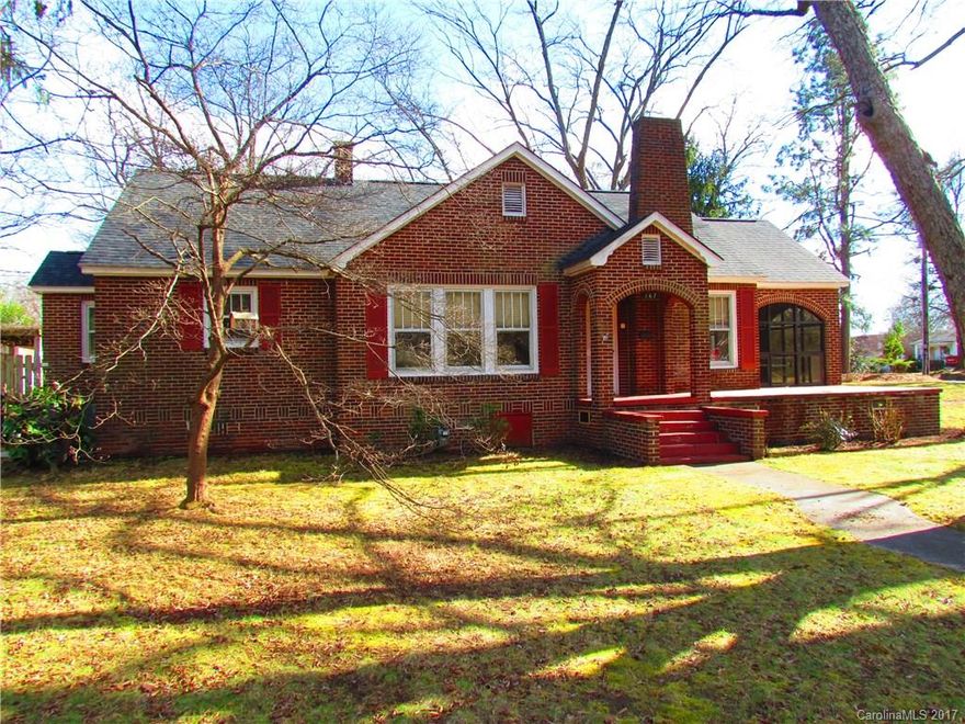 Charming 1937 brick home with sunporch. Original hardwood flooring. Kitchen with original cabinetry with nice updates. New refrigerator conveys. Beautifully updated bathroom. Laundry room off kitchen. Large yard with outbuilding and single car garage with potting shed and covered porch. Plenty of parking spaces. Close to downtown Concord, antique mall and breweries at Gibson Mill. Large attic space for tons of storage.