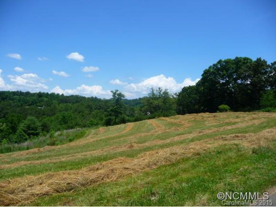 BEAUTIFUL CLEARED BUILDING LOT WITH EXCEPTIONAL LONG RANGE VIEWS IN A CLEAN, UPSCALE SUBDIVISION.