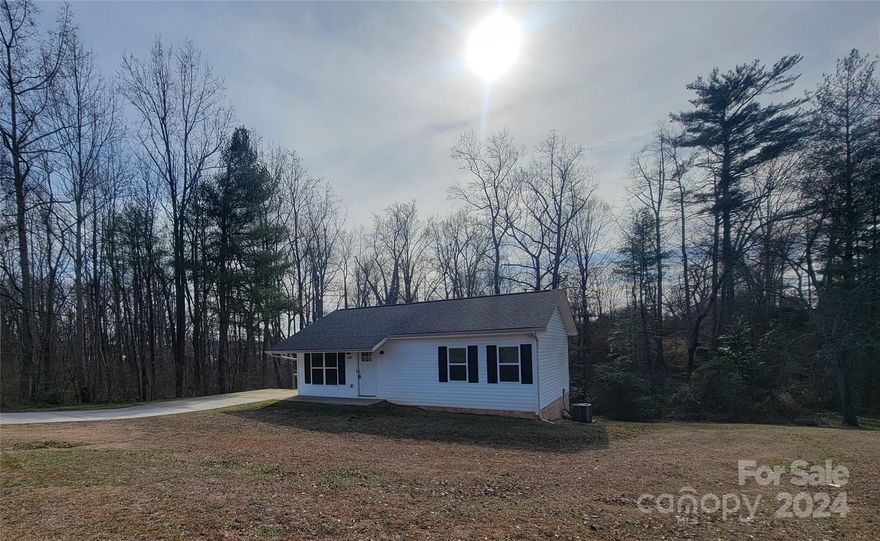 Practically a new house built in 2020! This 2-bedroom, 1 bathroom home is only 4 years old, and is nestled in a quiet Hudson neighborhood. The kitchen has solid wood birch cabinets and custom epoxy countertops. Washer and dryer area conveniently on the main level. Vinyl plank flooring throughout. American Standard HVAC System and Architectural Shingles still carry a warranty. Nice wrap around back deck great for grilling out and relaxing. Full unfinished basement (outdoor access only) that provides plenty of storage space. Concrete driveway and front porch. Come have a look for yourself before it’s gone!