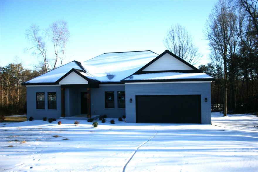 Amazing brand new ranch with 2 car garage. Brick front with hardy board sides. Trex decking, Quartz kitchen counter tops, self closing drawers, plenty of closet space, open floor-plan. This is a costume built home for under $400,000.00! Please verify schools and square footage.