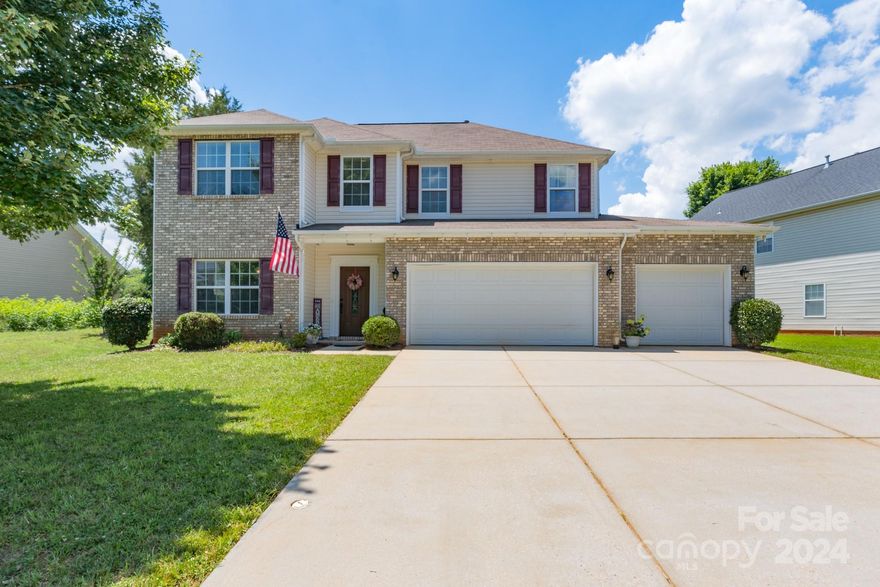 Welcome to the highly sought after Mill Creek Falls community. This stunning residence offers an open concept layout that seamlessly connects the living, dining, and kitchen areas. Brand new HVAC and Furnace in 2023 will keep your mind at ease this summer! The well-appointed kitchen boasts stainless steel appliances, granite countertops, tall bar eating area, and ample storage. First and second floors include built in ceiling speakers along with a central vacuum system. Luxurious Main Level primary bedroom suite includes a walk-in closet and an en-suite bathroom with dual vanities, a soaking tub, and a separate shower. Step outside to a beautifully renovated backyard, perfect for outdoor entertaining, family activities, or relaxing. Surround yourself with access to amenities such as a clubhouse, swimming pool, tennis courts, playground, fishing pond, disc golf course, and walking trails. Having top-rated schools, shopping, and dining around, this home offers the best of Clover living.