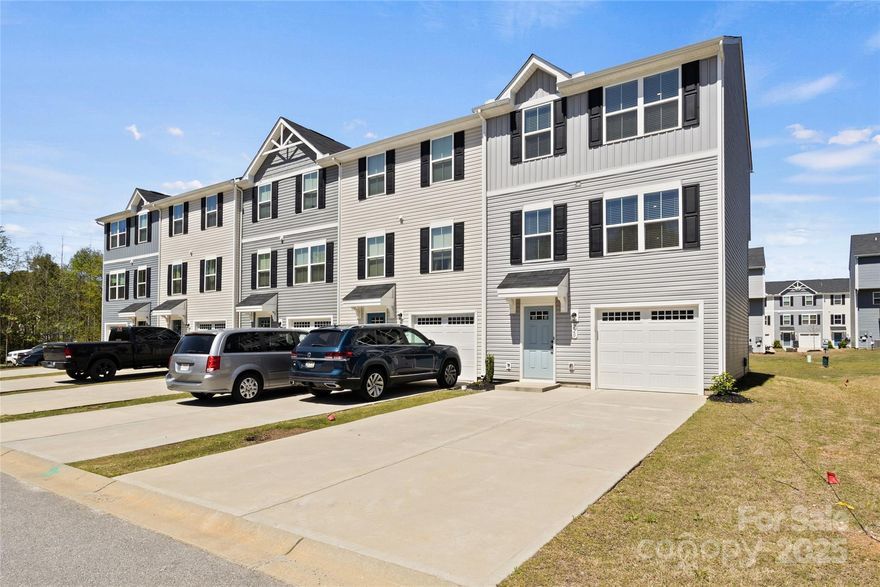 Motivated Seller! Open to reasonable offers. This charming 3-bedroom, 2.5-bathroom end-unit townhome is located 15 minutes from downtown Greenville, SC & 45 minutes from Hendersonville, NC. Situated near Swamp Rabbit Trail, perfect for outdoor enthusiasts. NEW CARPET was installed in October, replacing the carpet that was there prior. The kitchen has a granite kitchen island. Also conveniently on the same floor is a powder room upgrade. The first floor is finished, providing extra living space not commonly found in other units. This flex space area can serve as a workout area, den, or sitting room, adding versatility to the home. It features a door leading to the backyard for added convenience. The primary bedroom has a walk-in closet & ensuite bathroom. Two additional bedrooms are on the same floor. The home also includes a dedicated laundry closet nearby for added accessibility.