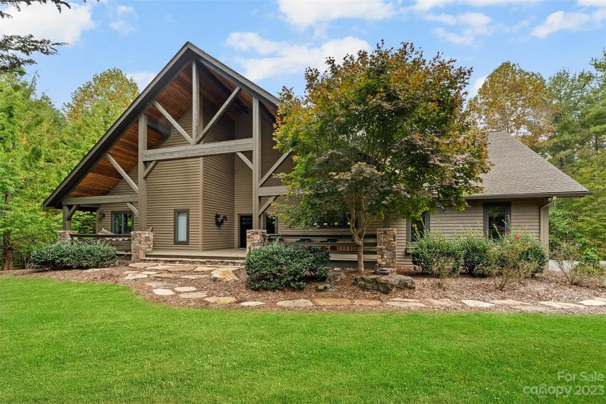 This stunning lake home is an equally perfect vacation or full time home.  Spacious open floor plan with 2 primary suites on the main level, flex space, great room w/all new hardwoods & massive stone fireplace. Cooks kitchen with plenty of workspace & island w/seating for gathering. Laundry, dropzone & half bath off garage entry w/finished media room above for movie nights. Guests or extended family will have plenty of room in the finished lower level.  Generous family room with full kitchen makes entertaining simple. Third ensuite bed/bath with tiled shower and soaking tub.  Exercise room & additional room for sleeping/office space.  Enjoy the view or entertain on the covered front and rear porches or lower level patio. Gravel path to the lake side w/firepit, deck seating & floating pier w/ lift. Quiet cove for floating & swimming. Short drive to Asheville, Charlotte and Blowing Rock. 15 minutes to Morganton shops/restaurants. Community pool & Fonta Flora MTB trail access in community