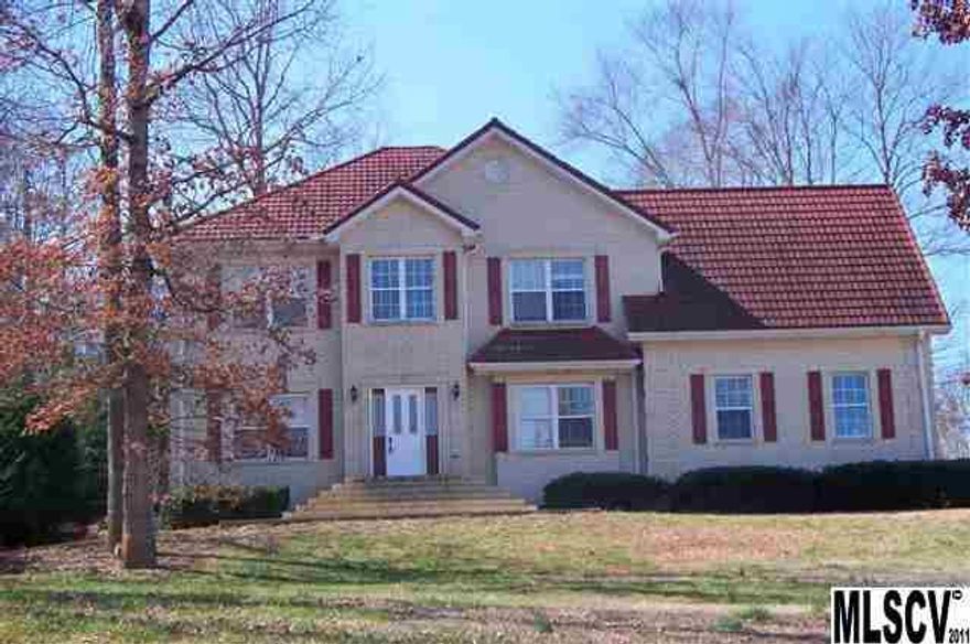 Lovely 2 story home with view of Lake Hickory.  4 bedrooms and 3.5 baths. Hardwoods in living room and dining room. Tile in kitchen.  Kitchen has new stainless steel appliances.  Seller has done repairs including new paint, new carpeting, refinished hardwoods and   New appliances.  Kitchen has great cabinetry  with granite countertops.  This is a Fannie Mae HomePath property. Purchase it for as little as 5% down.  Don't miss this one!  This property is approved for HomePath Renovation Mortgage Financing.