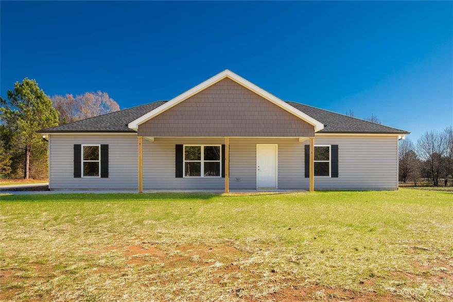 Looking for a top-notch new construction in the heart of Clover? You've found it! This property boasts a split bedroom floorplan with three bedrooms and two full baths. Tray ceilings, walk-in closets, and nearly two acres of land without any HOA fees. With 1573 sq ft of living space and a shop/building on the property, this home has all the bells and whistles. Also boasting a massive 576 sq ft covered back patio area, you'll have plenty of room for those backyard get-togethers! Plus, it's conveniently located near Lake Wylie.